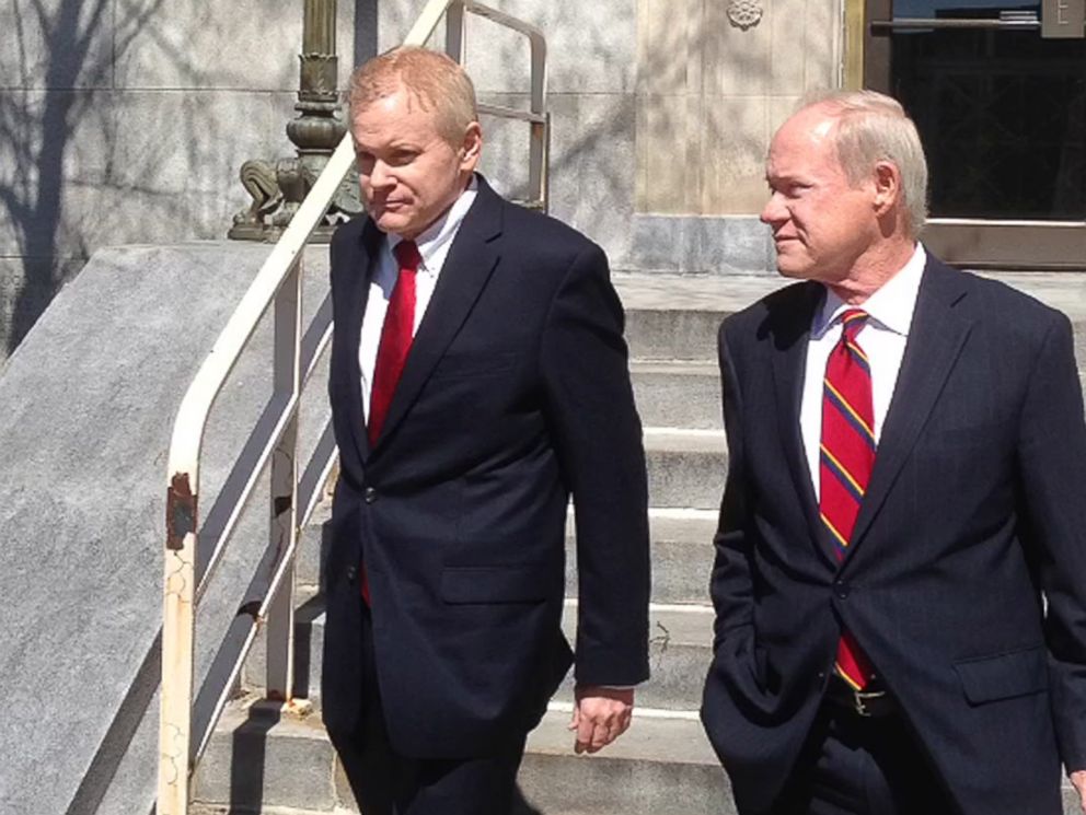 PHOTO: Eric C. Conn, left, walks out of a federal courthouse with defense attorney Joe Lambert on Tuesday, April 12, 2016, in Lexington, Ky., after being released on bond.