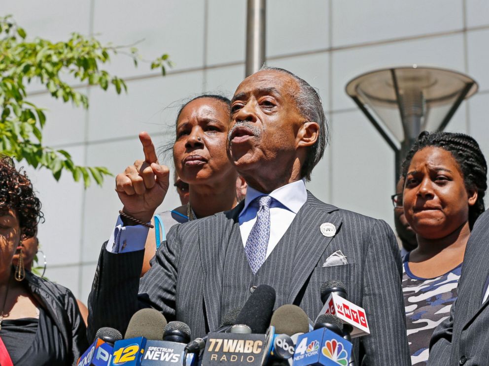The Rev. Al Sharpton, second from right, gestures as he speaks to the media alongside members of Eric Garners family, including Erica Garner, far right, after meeting with Department of Justice officials, Wednesday, June 21, 2017, in New York.