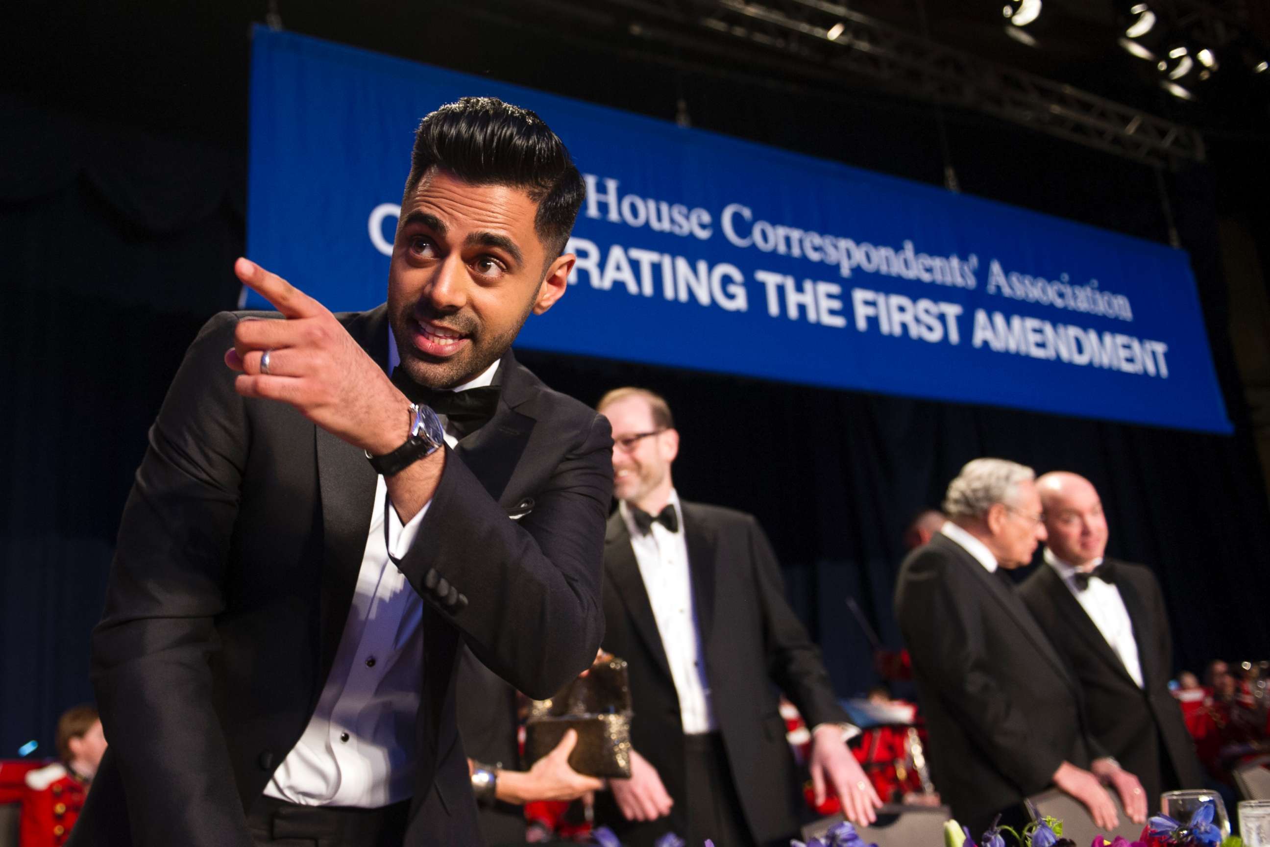 PHOTO: The Daily Show correspondent Hasan Minhaj stands at the head table during the White House Correspondents' Dinner in Washington, D.C., on April 29, 2017.