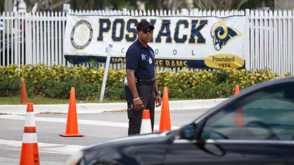 PHOTO: A security guard stands outside the entrance to the David Posnack Jewish Community Center and David Posnack Jewish Day School after people were evacuated because of a bomb threat, Feb. 27, 2017, in Davie, Fla.
