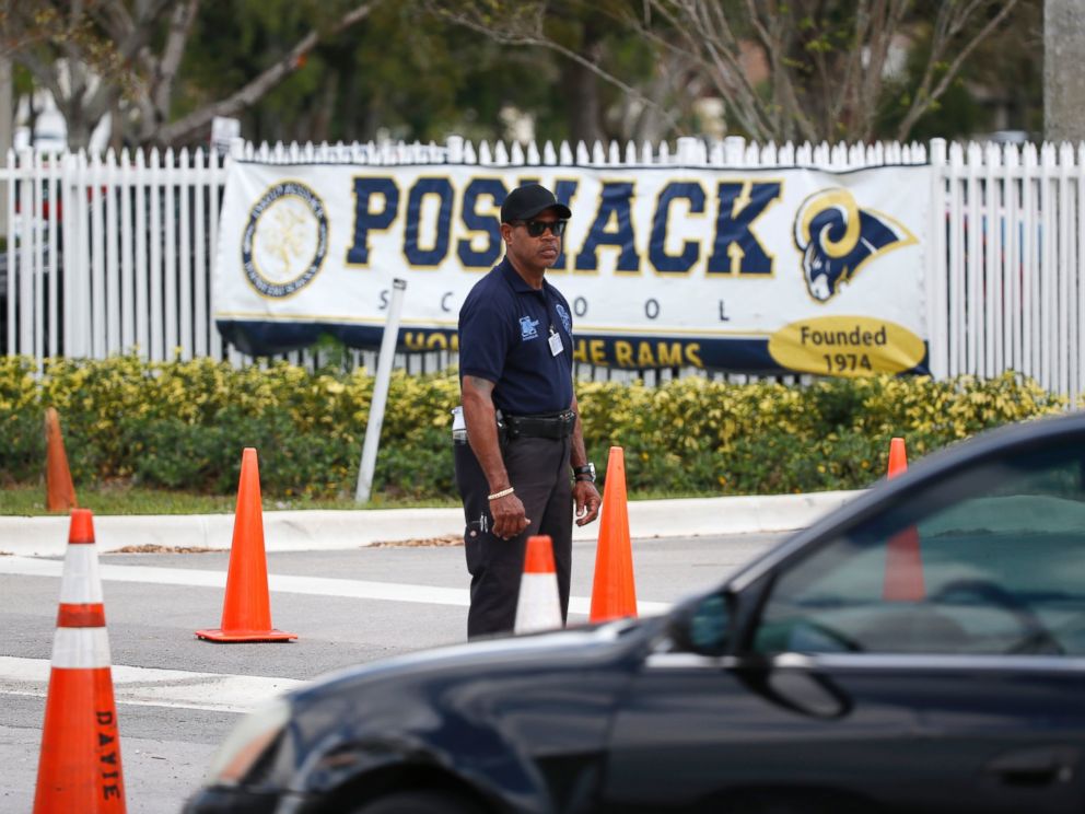 PHOTO: A security guard stands outside the entrance to the David Posnack Jewish Community Center and David Posnack Jewish Day School after people were evacuated because of a bomb threat, Feb. 27, 2017, in Davie, Fla.