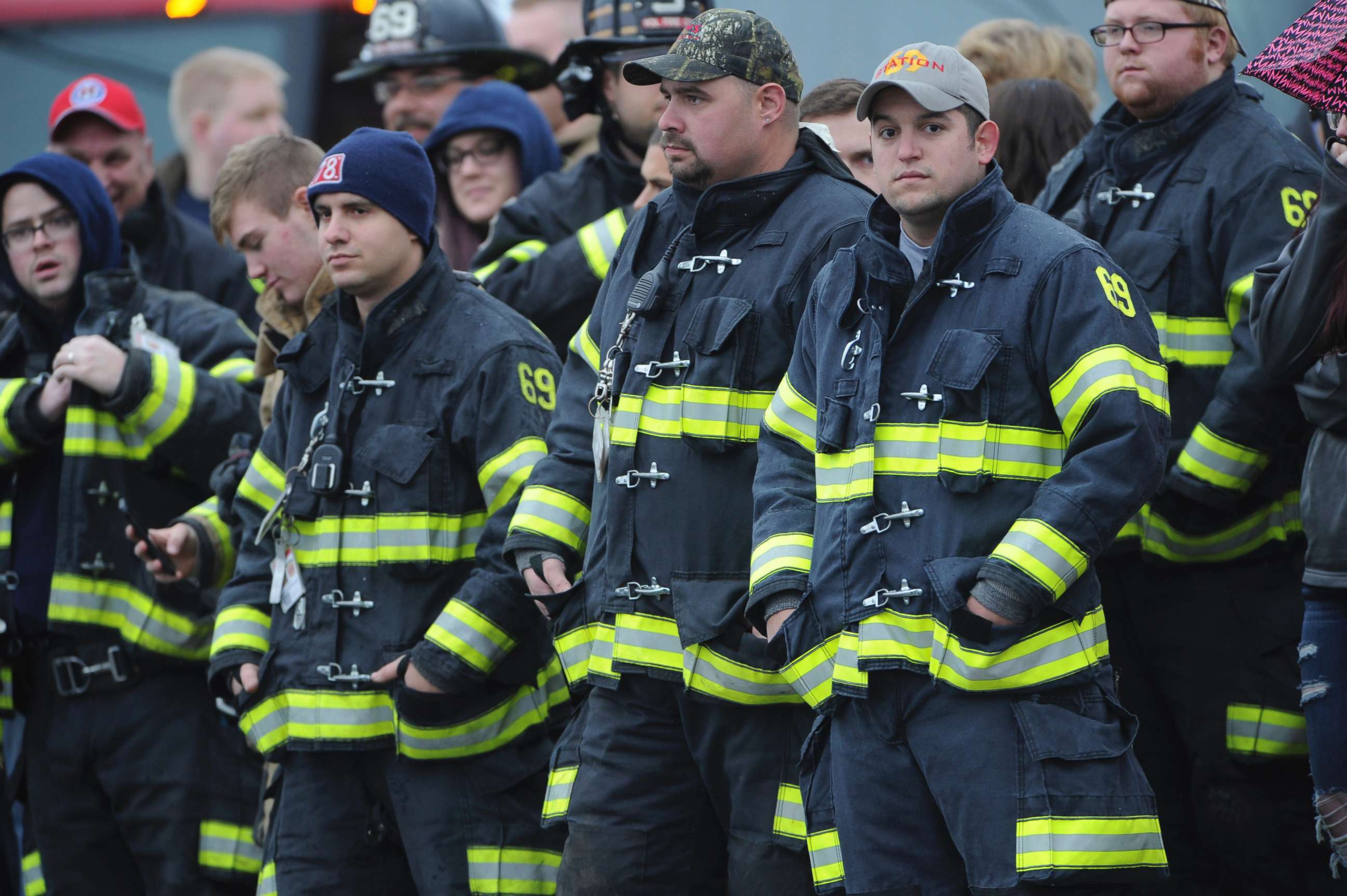 PHOTO: Lower Burrell Fire Station #69 waits with a crowd for the procession transporting the casket of slain New Kensington Police Officer Brian Shaw to the Rusiewicz Funeral Home in Lower Burrell, Pa., Nov. 18, 2017. 