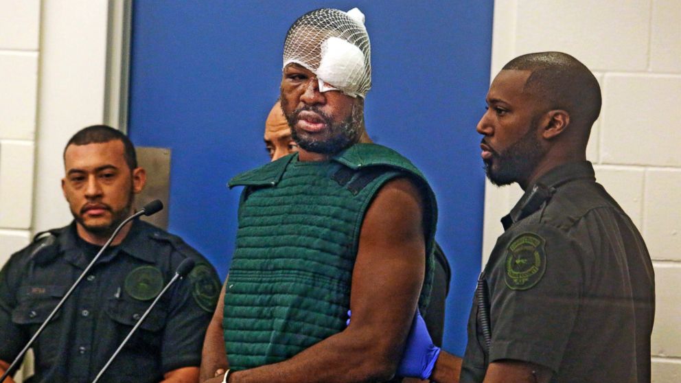 Markeith Loyd, suspected of fatally shooting a Florida police officer, makes a court appearance, Jan. 19, 2017, at the Orange County Jail, in Orlando, Fla. Loyd spoke out of turn and was defiant during the appearance on charges of killing his pregnant ex-girlfriend. He was injured during his arrest Tuesday night following a weeklong manhunt.