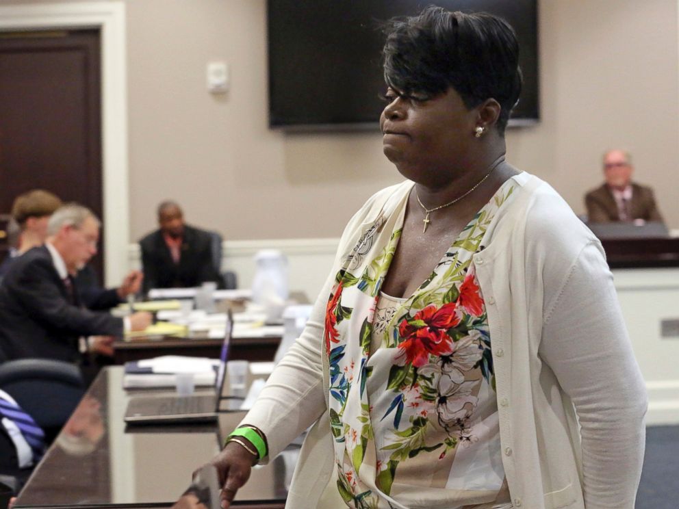 PHOTO: Nadine Lance Collier, Ethel Lance's daughter walks past Dylann Roof, seated at the defense table in the Charleston County Court, April 10, 2017, after she addressed the court during his guilty plea hearing on murder charges in Charleston,S.C.