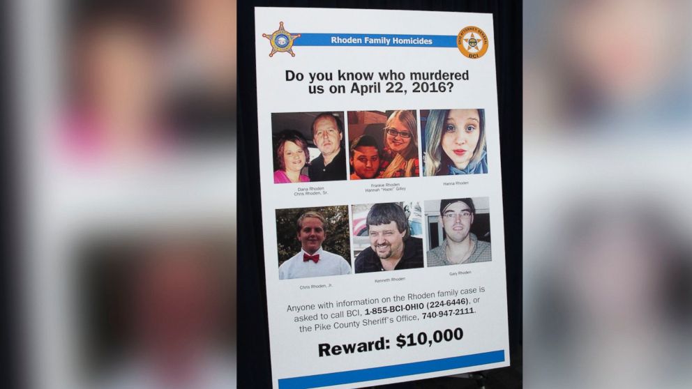 PHOTO: A poster asking for information about the 2016 unsolved killings of eight family members in southern Ohio, is displayed at the Ohio Attorney General's Office during a press conference, April 13, 2017, in Columbus Ohio.