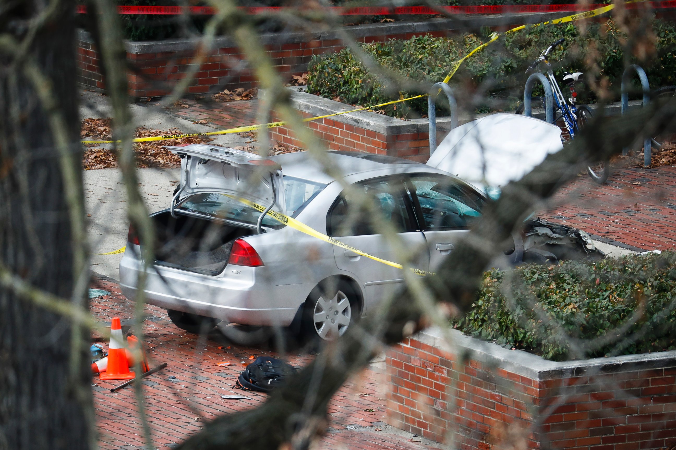 PHOTO: A car inside a police line sits on the sidewalk as authorities respond to an attack on campus at Ohio State University, Monday, Nov. 28, 2016, in Columbus, Ohio.