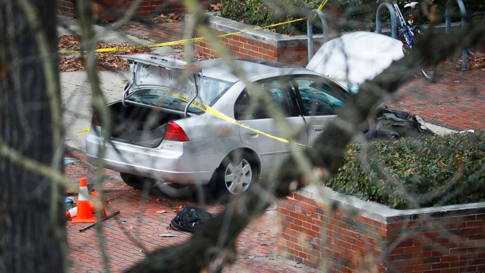 PHOTO: A car inside a police line sits on the sidewalk as authorities respond to an attack on campus at Ohio State University, Monday, Nov. 28, 2016, in Columbus, Ohio.