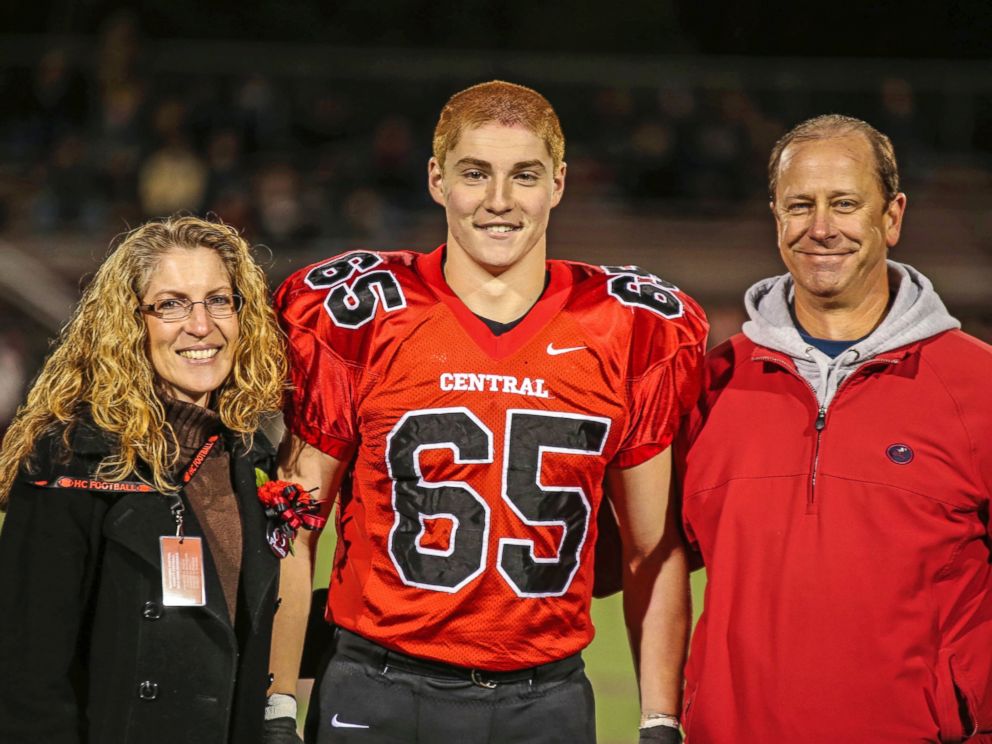 PHOTO: This Oct. 31, 2014 photo shows Timothy Piazza, center, with his parents Evelyn Piazza, left, and James Piazza, right, during Hunterdon Central Regional High School footballs Senior Night at the high schools stadium in Flemington, N.J.
