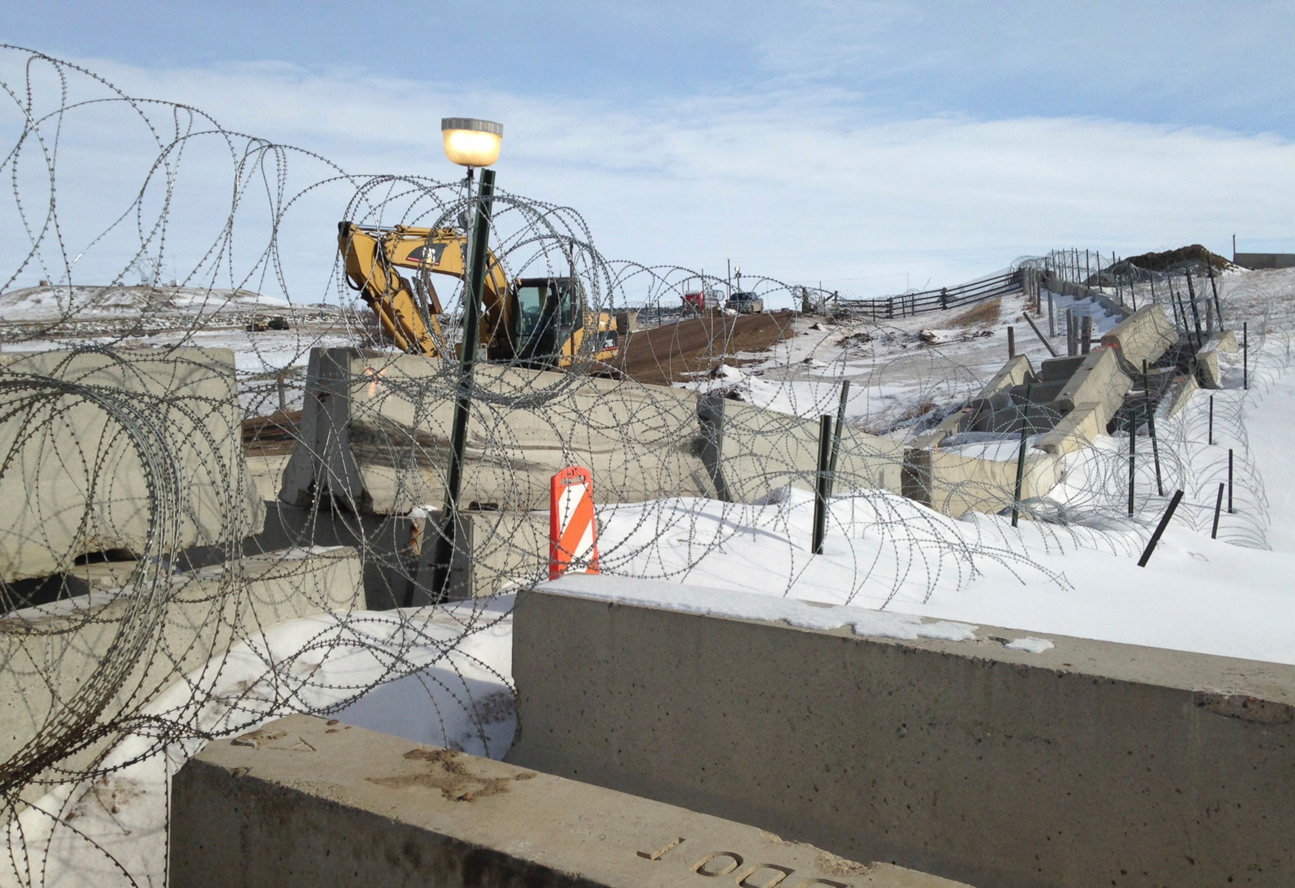 PHOTO: Razor wire and concrete barriers protect access to the Dakota Access pipeline drilling site, Feb. 9, 2017 near Cannon Ball, North Dakota.