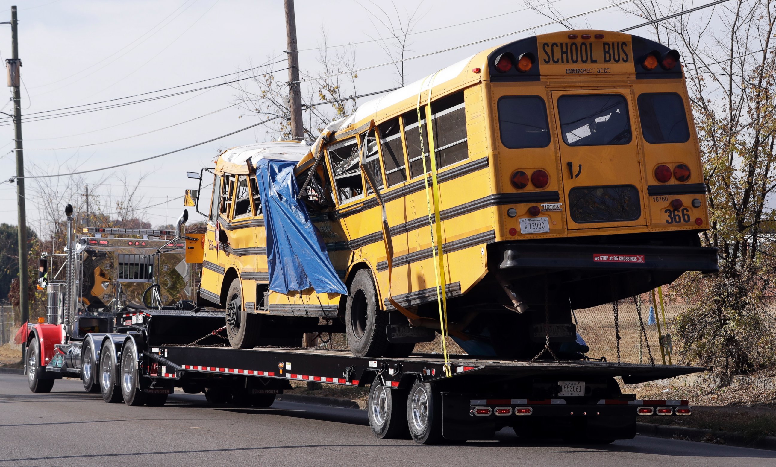 PHOTO: A school bus is carried away Tuesday, Nov. 22, 2016, in Chattanooga, Tenn., from the site where it crashed on Monday.