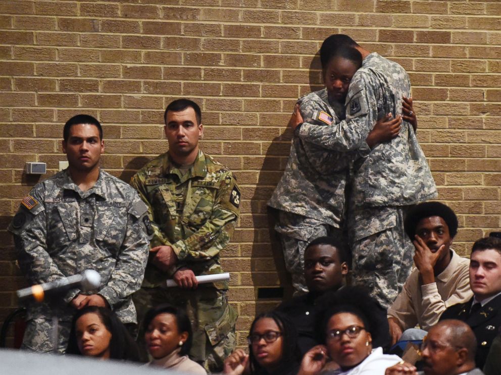 PHOTO: Bowie State University ROTC students comfort each other during a memorial vigil for Richard Collins III, who was killed Saturday at the University of Maryland in College Park, as they gather at Bowie State's auditorium in Bowie, Md., May 22, 2017. 