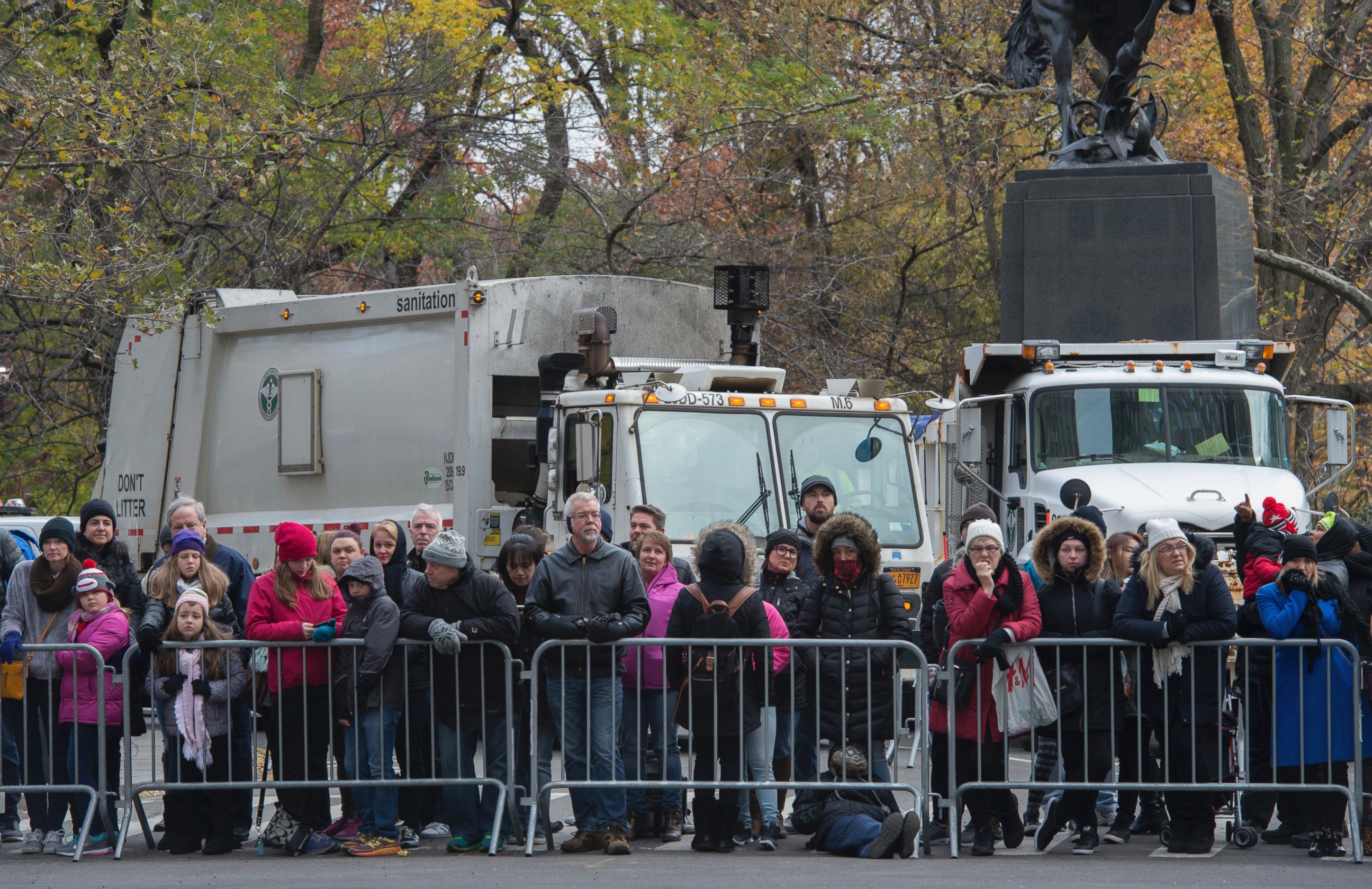 PHOTO: NYC Department of Sanitation trucks block the street at Central Park South as people gather before the Macy's Thanksgiving Day Parade, Nov. 24, 2016, in New York.