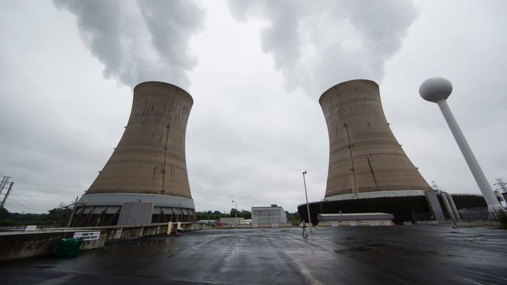 A Monday, May 22, 2017 file photo shows cooling towers at the Three Mile Island nuclear power plant in Middletown, Pa.