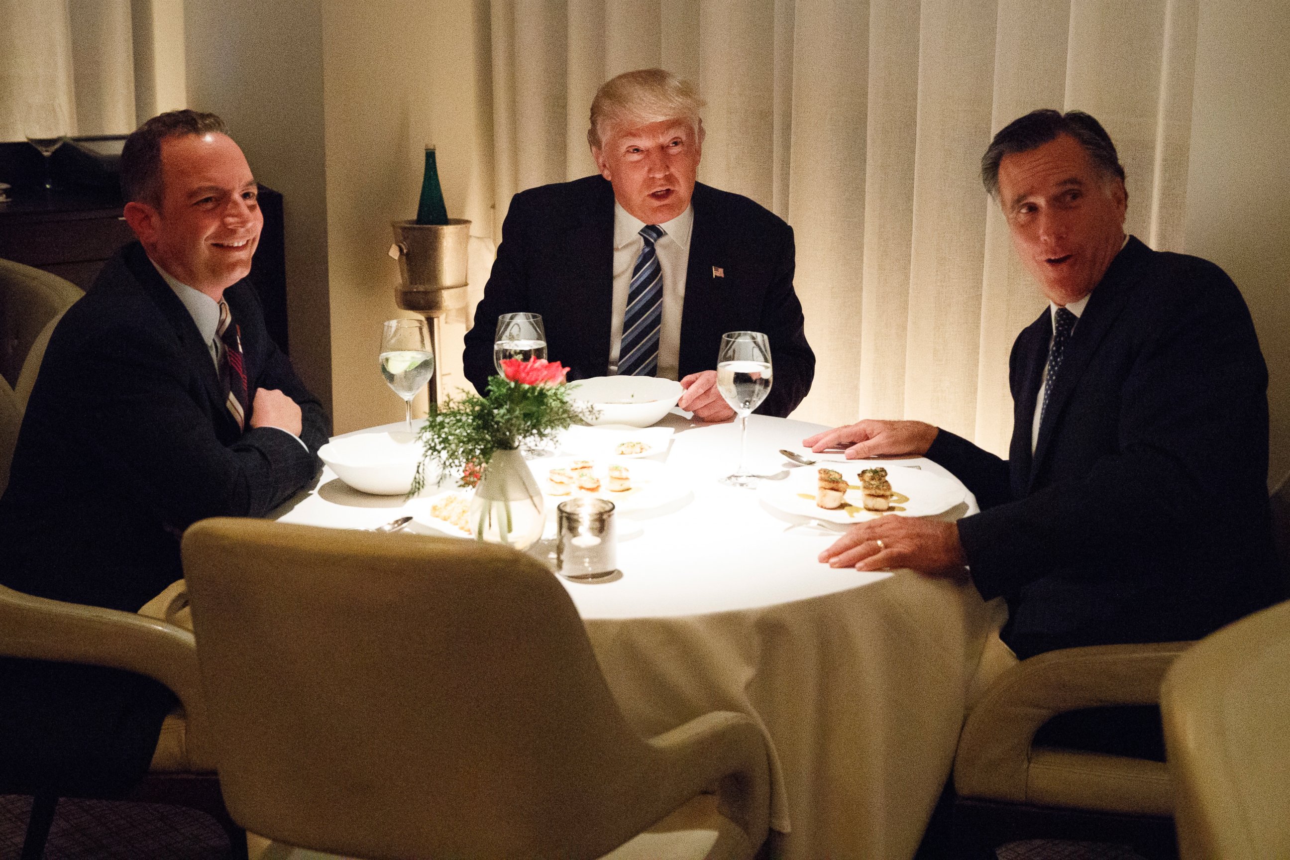 PHOTO: Donald Trump, center, eats dinner with Mitt Romney, right, and Trump Chief of Staff Reince Priebus at Jean-Georges restaurant, Nov. 29, 2016, in New York. 