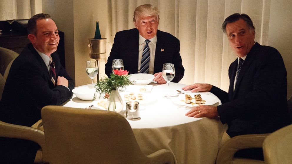 Donald Trump, center, eats dinner with Mitt Romney, right, and Trump Chief of Staff Reince Priebus at Jean-Georges restaurant, Nov. 29, 2016, in New York. 