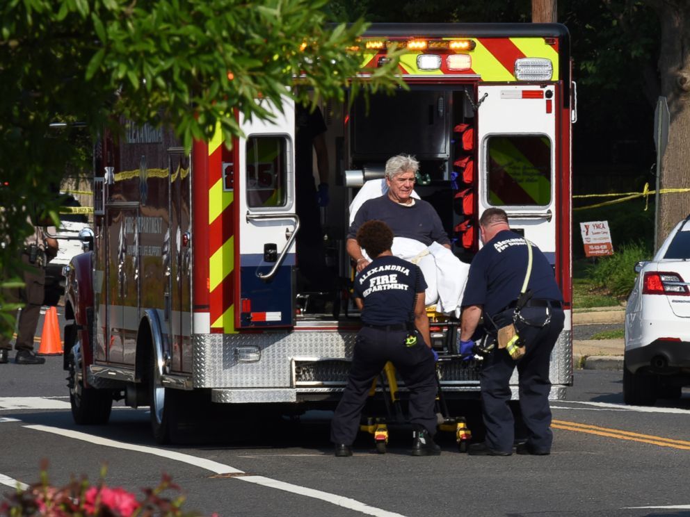 PHOTO: Rep. Roger Williams is placed into an ambulance at the scene of a shooting at a baseball field in Alexandria, Va., June 14, 2017. 