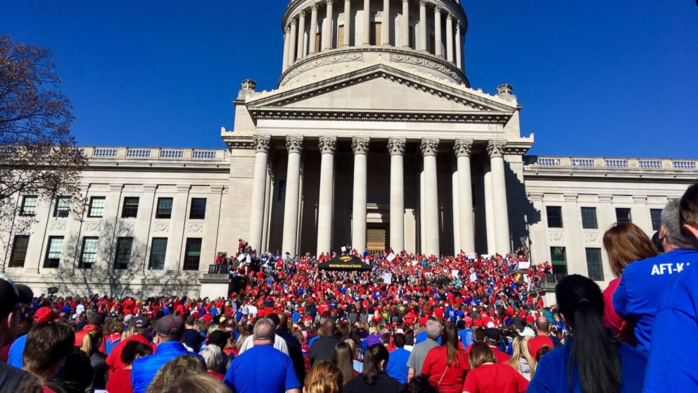 Thousands of West Virginia teachers attend a rally at the state Capitol in Charleston, W.Va., Monday, Feb. 26, 2018. Teachers across West Virginia will continue a walkout over pay and benefits for a fourth day.