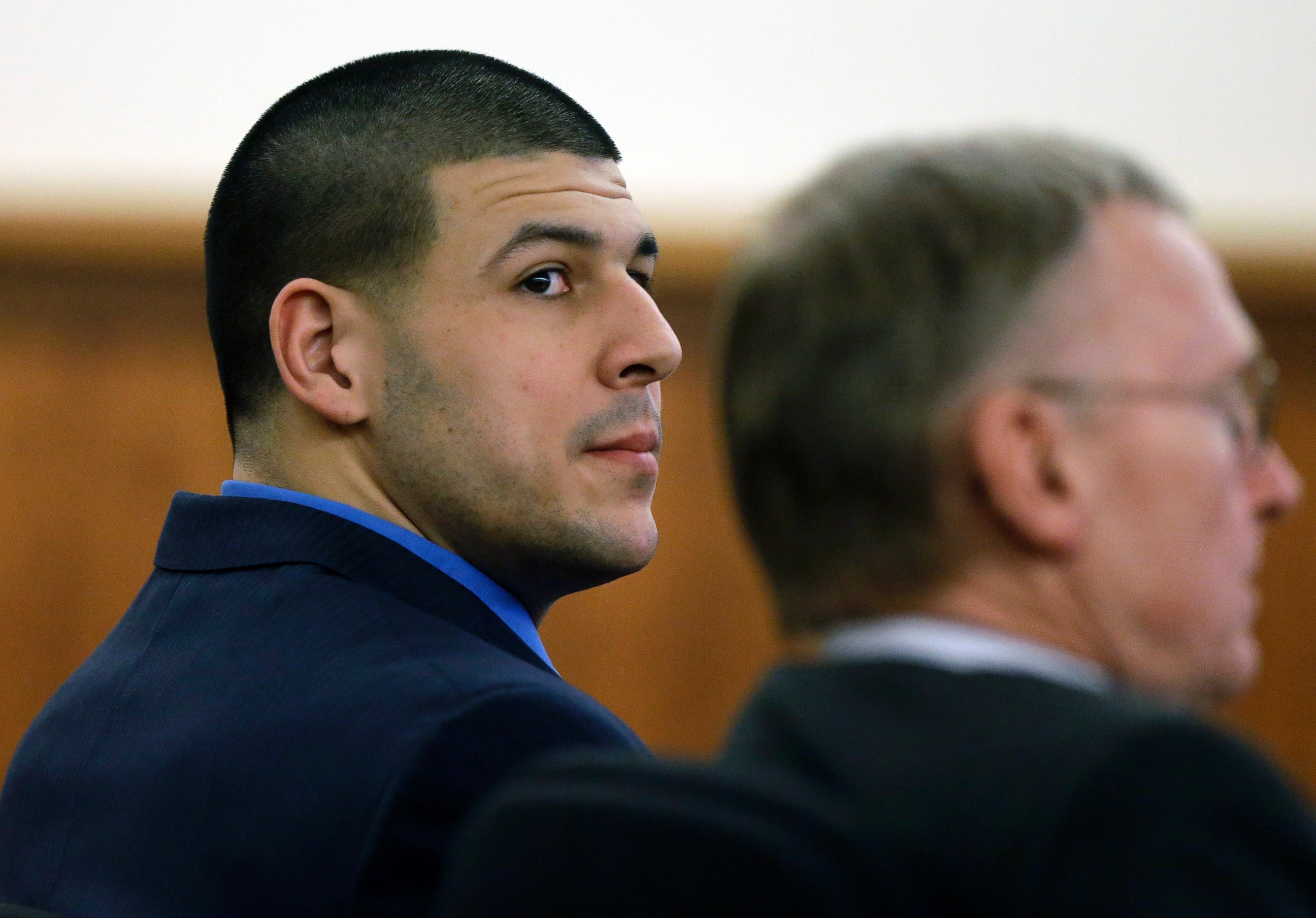 PHOTO: Former New England Patriots football player Aaron Hernandez sits with his defense attorney Charles Rankin during the afternoon session of his murder trial, Feb. 6, 2015, in Fall River, Mass.