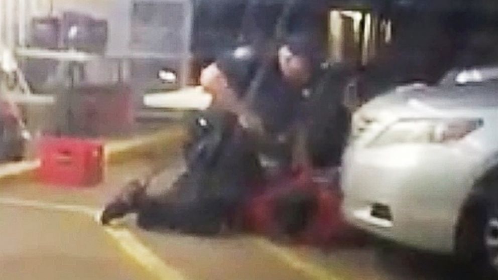 PHOTO: In this photo made from video, Alton Sterling is held by two Baton Rouge police officers outside a convenience store in Baton Rouge, Louisiana, July 5, 2016, moments before Sterling was fatally shot.