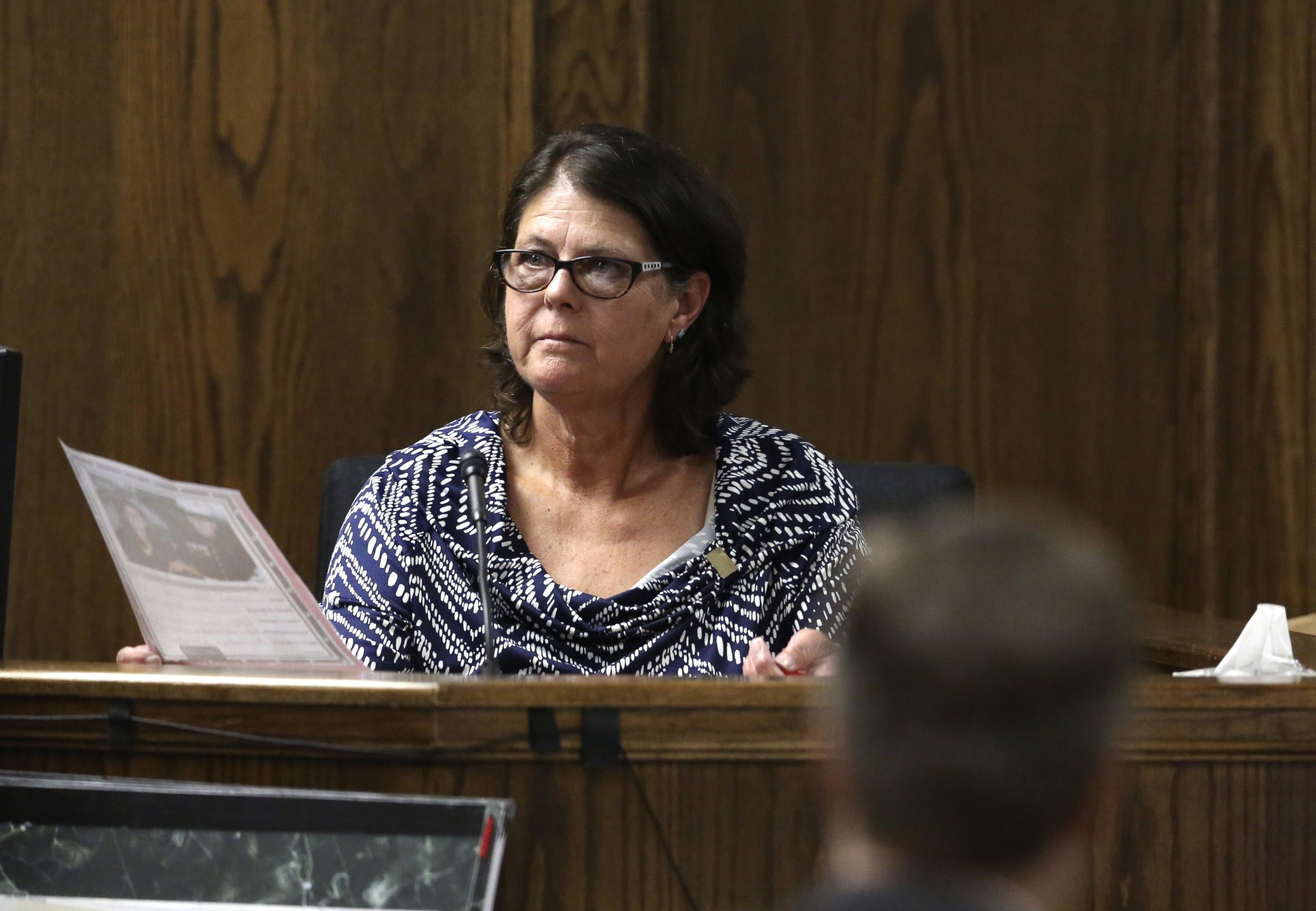 PHOTO: Jodi Routh, right, mother of former Marine Cpl. Eddie Ray Routh, pauses as she speaks about a photo of her son that was admitted into evidence during his capital murder, Feb. 19, 2015, in Stephenville, Texas.  