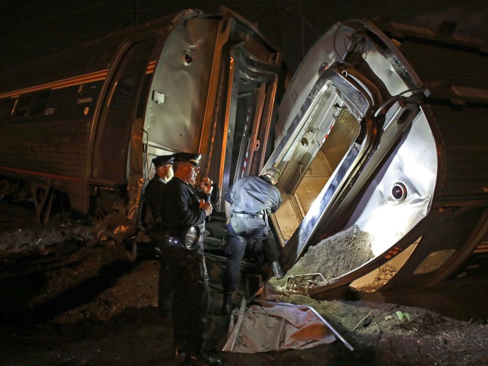 PHOTO: Emergency personnel work the scene of a train wreck, May 12, 2015, near Philadelphia.