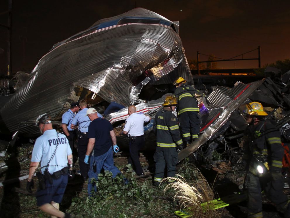 PHOTO: Emergency personnel work the scene of a train wreck, May 12, 2015, outside Philadelphia.