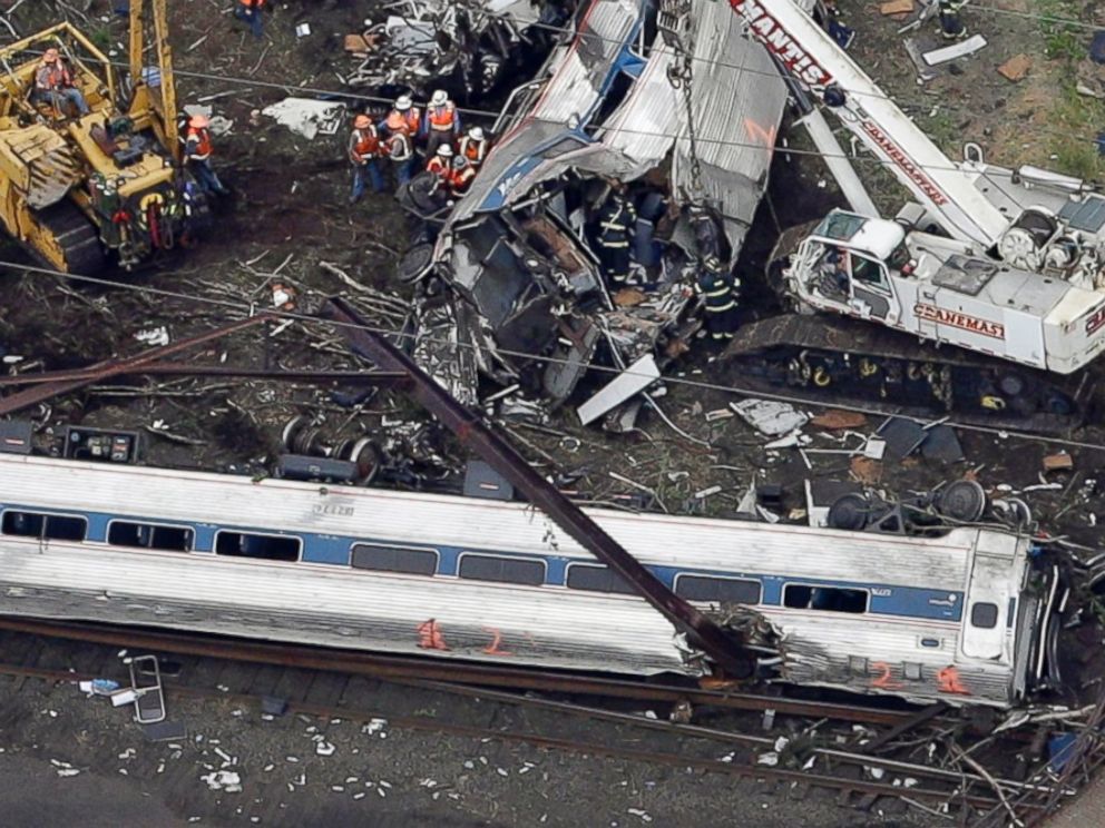 PHOTO: Emergency personnel work at the scene of a deadly train wreck, May 13, 2015, in Philadelphia.