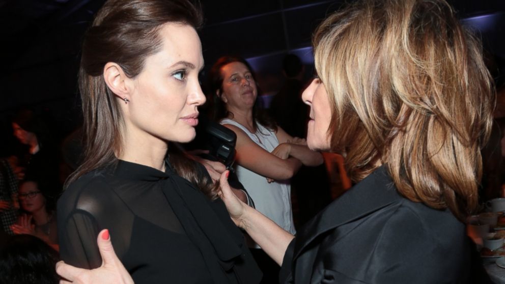 Angelina Jolie chats with Amy Pascal at The Hollywood Reporter 'Women in Entertainment' Power 100 Breakfast in Los Angeles, Calif. on Dec. 10, 2014.