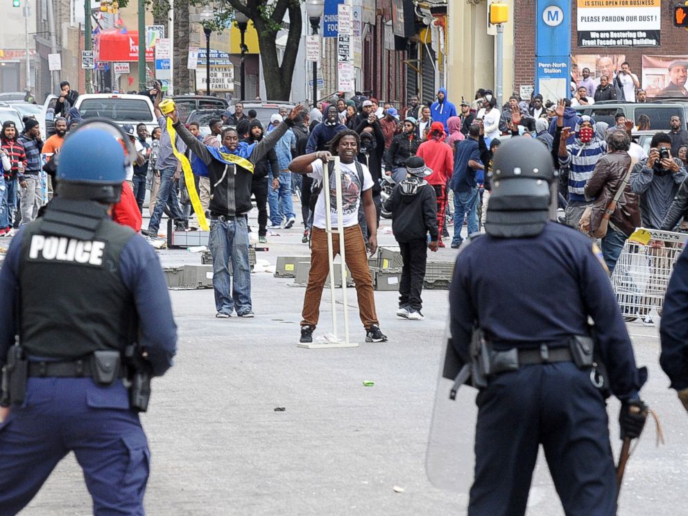 PHOTO: Protesters face police following the funeral of Freddie Gray, April 27, 2015, in Baltimore.