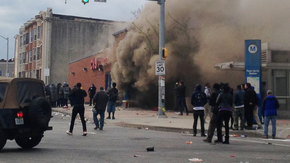 PHOTO: Smoke billows from a CVS Pharmacy store in  Baltimore on April 27, 2015.