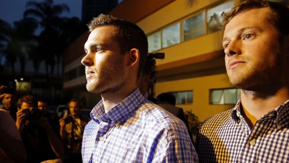 PHOTO: American Olympic swimmers Gunnar Bentz, left, and Jack Conger leave a police station in the Leblon neighborhood of Rio de Janeiro, Brazil, Thursday, Aug. 18, 2016. 