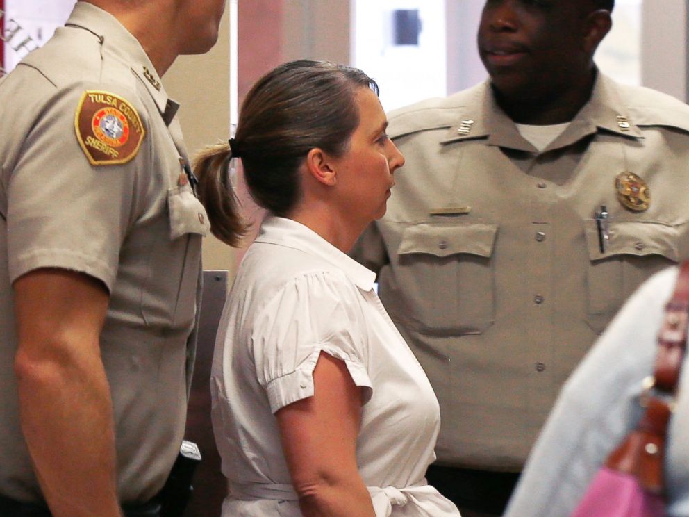 PHOTO: Tulsa police officer Betty Shelby is led from the Tulsa County Sheriff's office into a courtroom in the Tulsa County courthouse, in Tulsa, Okla., Sept. 30, 2016.