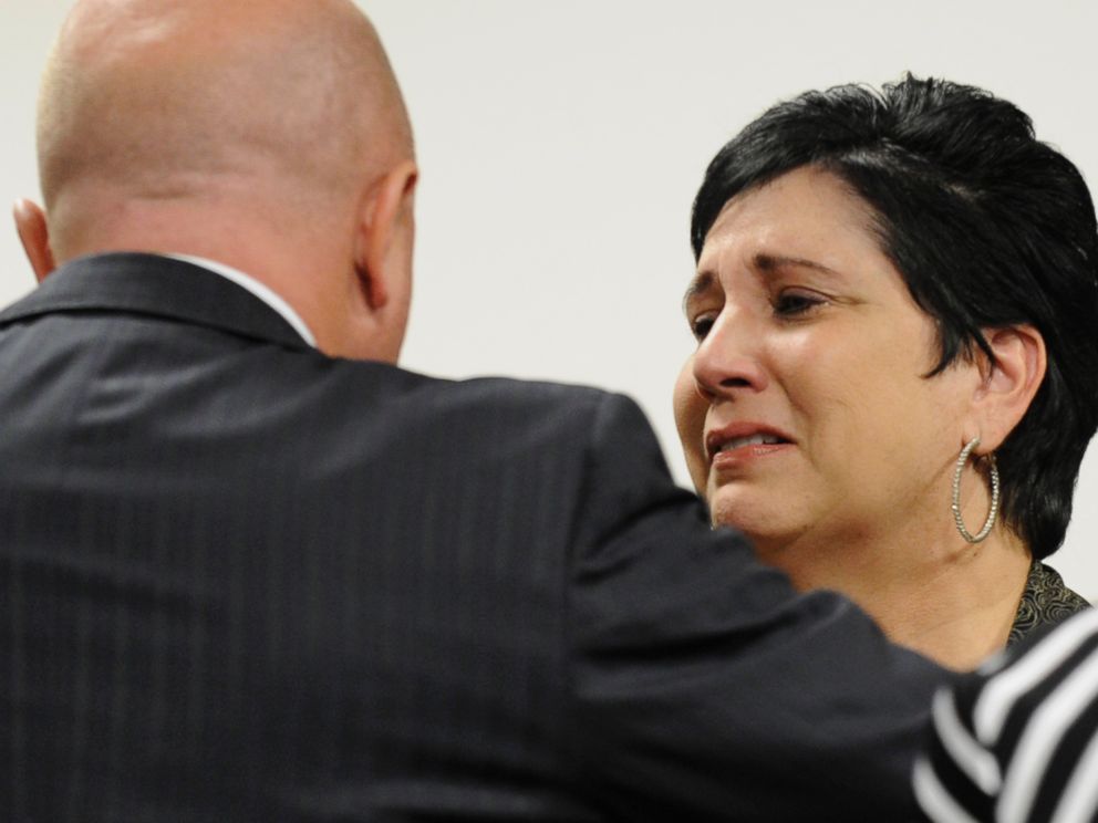 PHOTO: Rosalie Bolin, the wife of Oscar Ray Bolin Jr. hugs defense attorney Bjorn Brunvand after Oscar Ray Bolin Jr. was found guilty in the killing of Natalie Blanche Holley, April 19, 2012 in Tampa. 