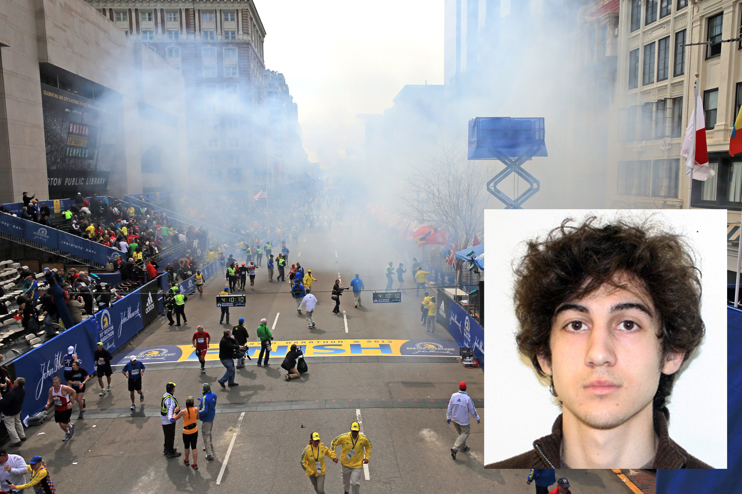 PHOTO: Smoke rises after two explosions went off near the finish line of the 117th Boston Marathon, April 15, 2013. FBI released an image of suspect Dzhokhar Tsarnaev before he was apprehended. 