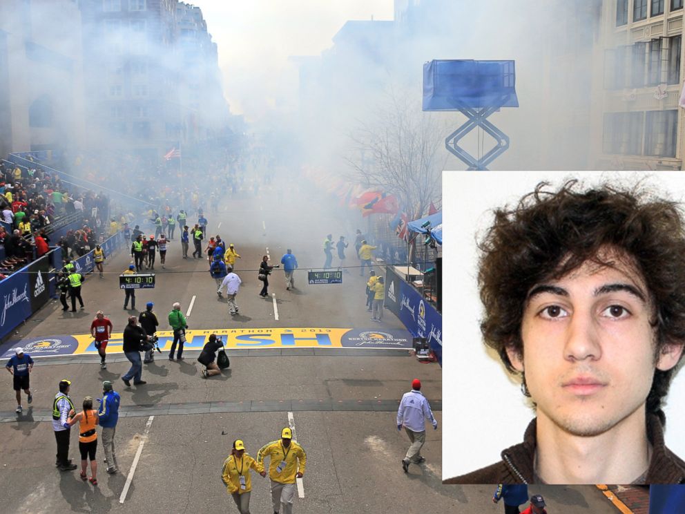 PHOTO: Smoke rises after two explosions went off near the finish line of the 117th Boston Marathon, April 15, 2013. FBI released an image of suspect Dzhokhar Tsarnaev before he was apprehended.