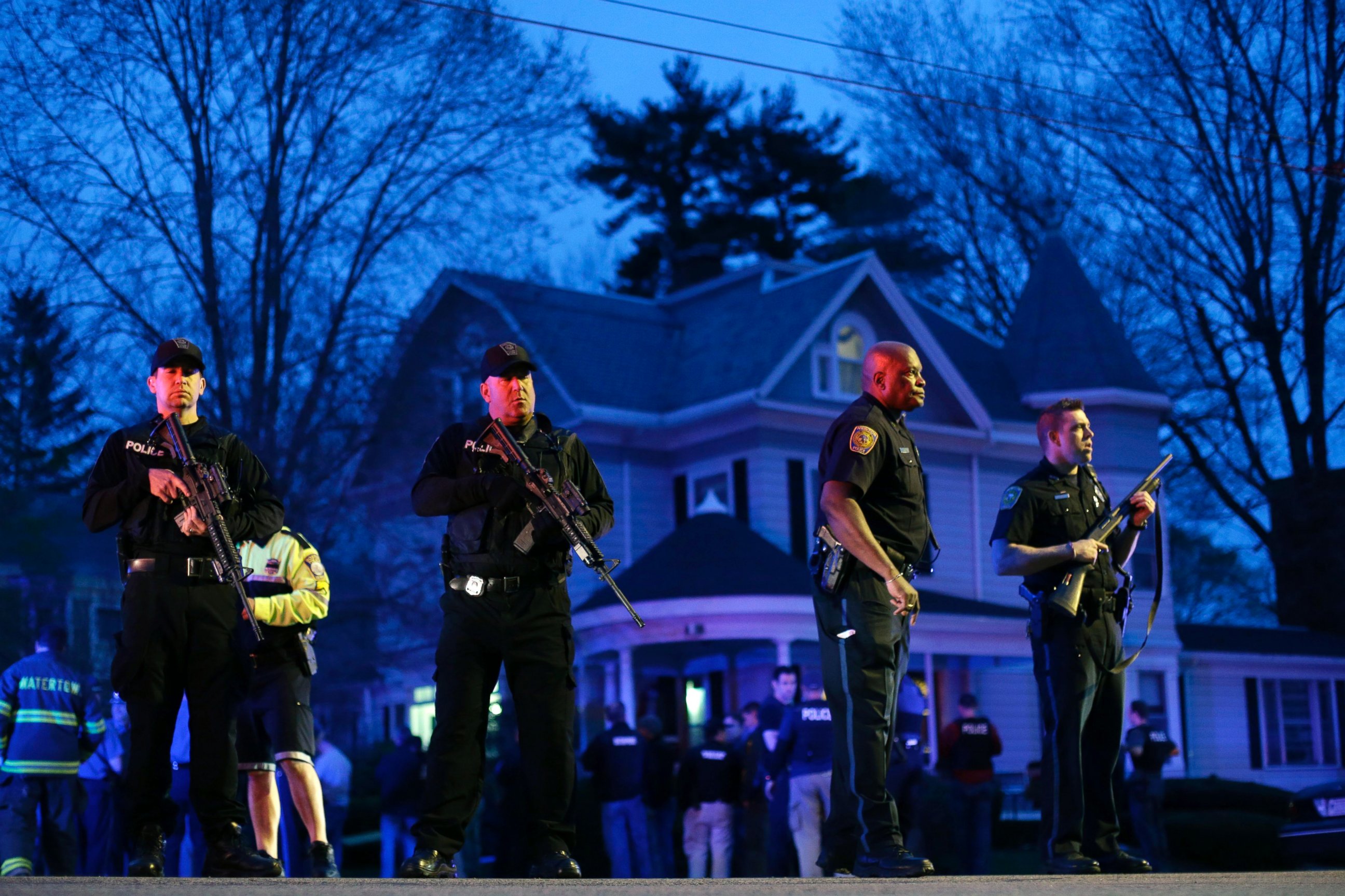 PHOTO: Police officers guard the entrance to Franklin street where there is an active crime scene search for the suspect in the Boston Marathon bombings, April 19, 2013, in Watertown, Mass.