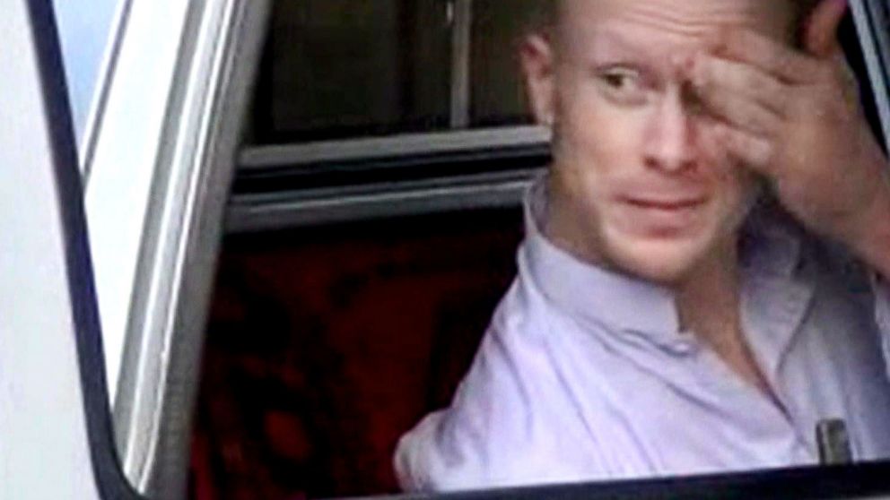 In this file image taken from video obtained from Voice Of Jihad Website, Sgt. Bowe Bergdahl sits in a vehicle guarded by the Taliban in eastern Afghanistan. A senior defense official says Bowe Bergdahl has been returned to regular Army duty. 