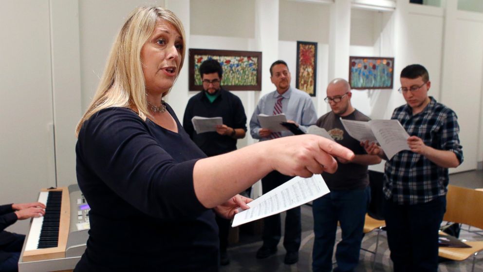 PHOTO: Butterfly Music Transgender Chorus Founder Sandi Hammond directs members during a rehearsal  at a church in Cambridge, Mass on Oct. 7, 2015.