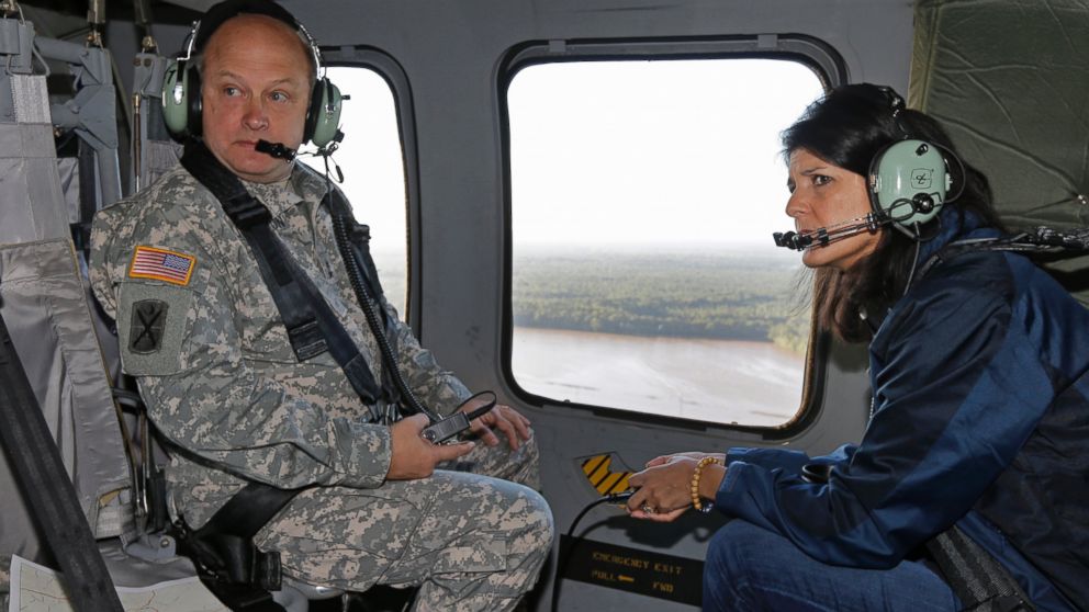 PHOTO: South Carolina Gov. Nikki Haley and Major Gen. Bob Livingston view flood damage from a helicopter in Columbia, S.C., Oct. 6, 2015. 