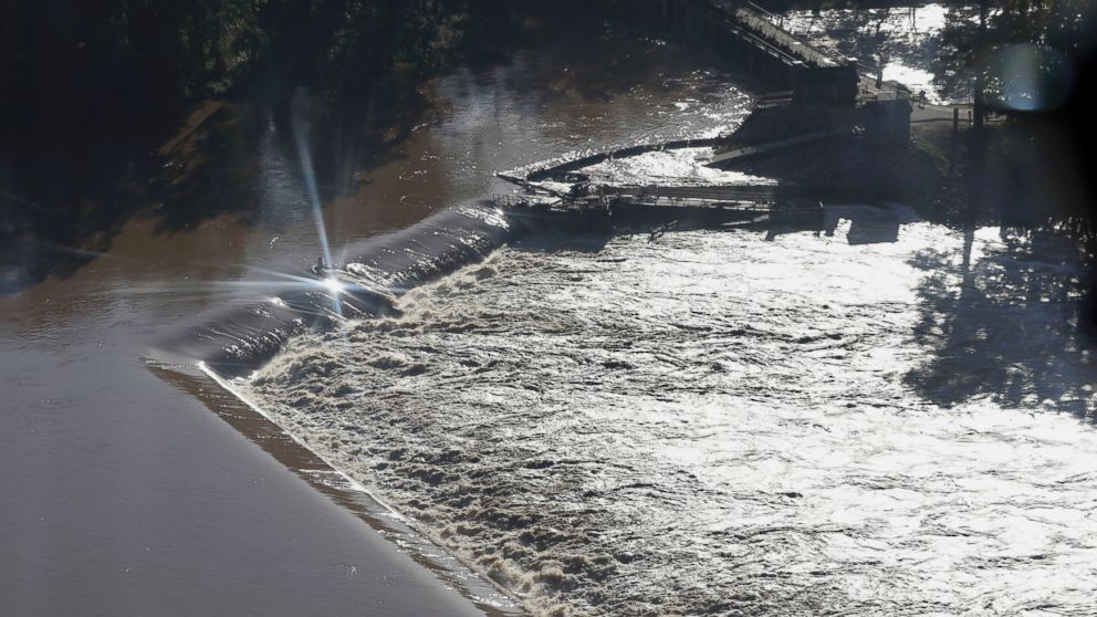 PHOTO: Floodwaters rush over a diversion dam in Columbia, S.C., Oct. 6, 2015.