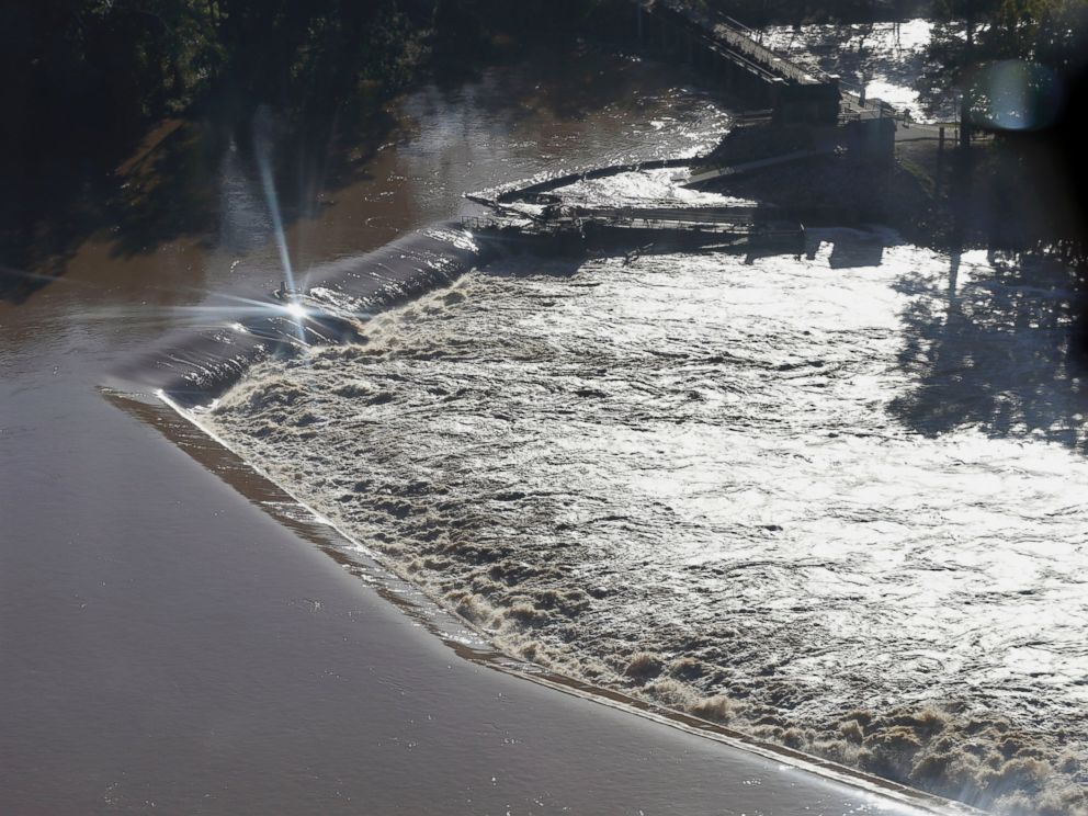 PHOTO: Floodwaters rush over a diversion dam in Columbia, S.C., Oct. 6, 2015.