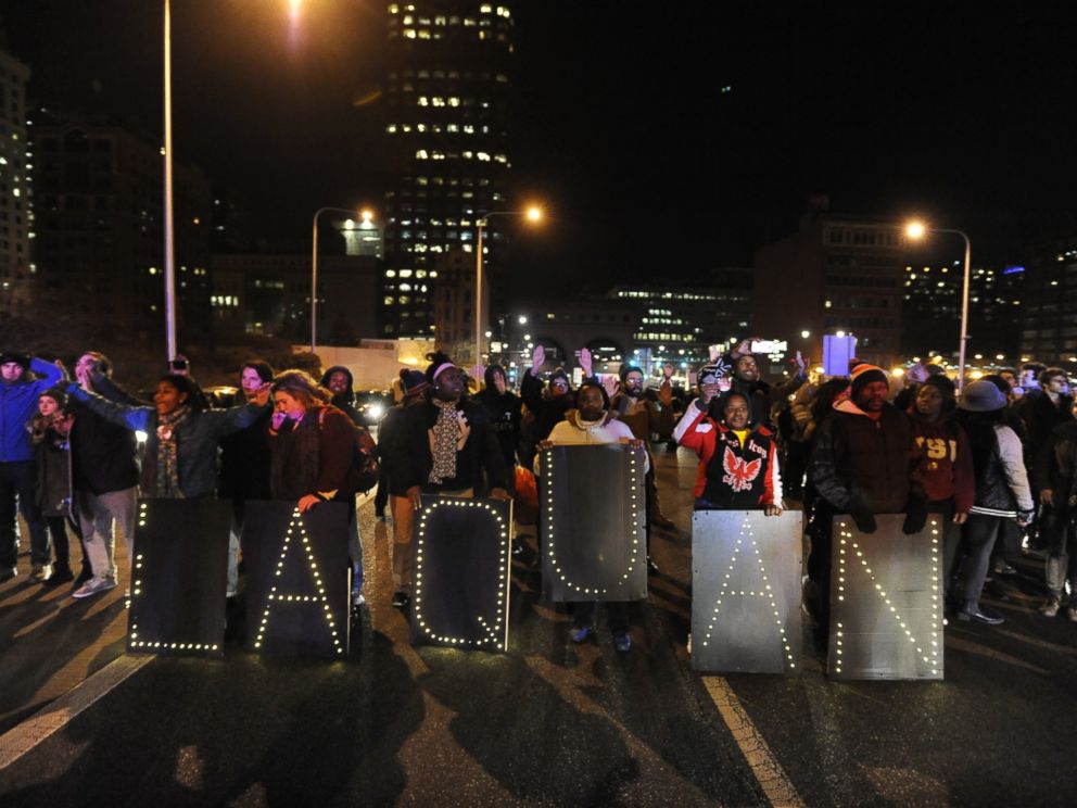 PHOTO: Protesters march during a demonstration for 17-year-old Laquan McDonald in Chicago on Nov. 24, 2015.
