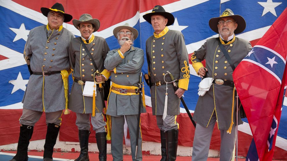 PHOTO: Descendants of American Southerners wearing Confederate-era uniforms pose for pictures during a party to celebrate the 150th anniversary of the end of the American Civil War in Santa Barbara d'Oeste, Brazil, April 26, 2015.