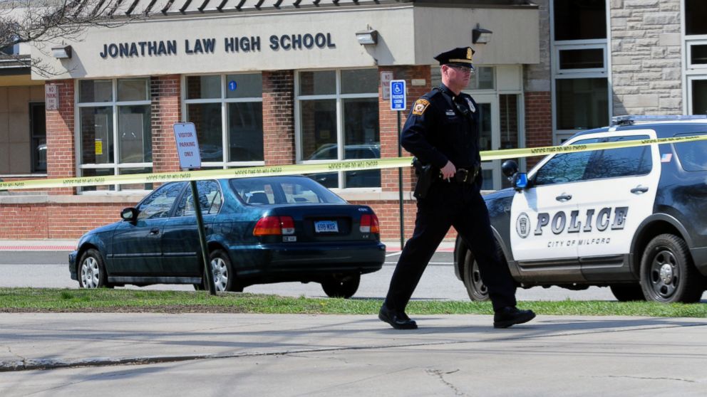 PHOTO: Police remain on scene at Jonathan Law High School after a 16-year-old girl was stabbed to death in Milford, Conn., April 25, 2014.