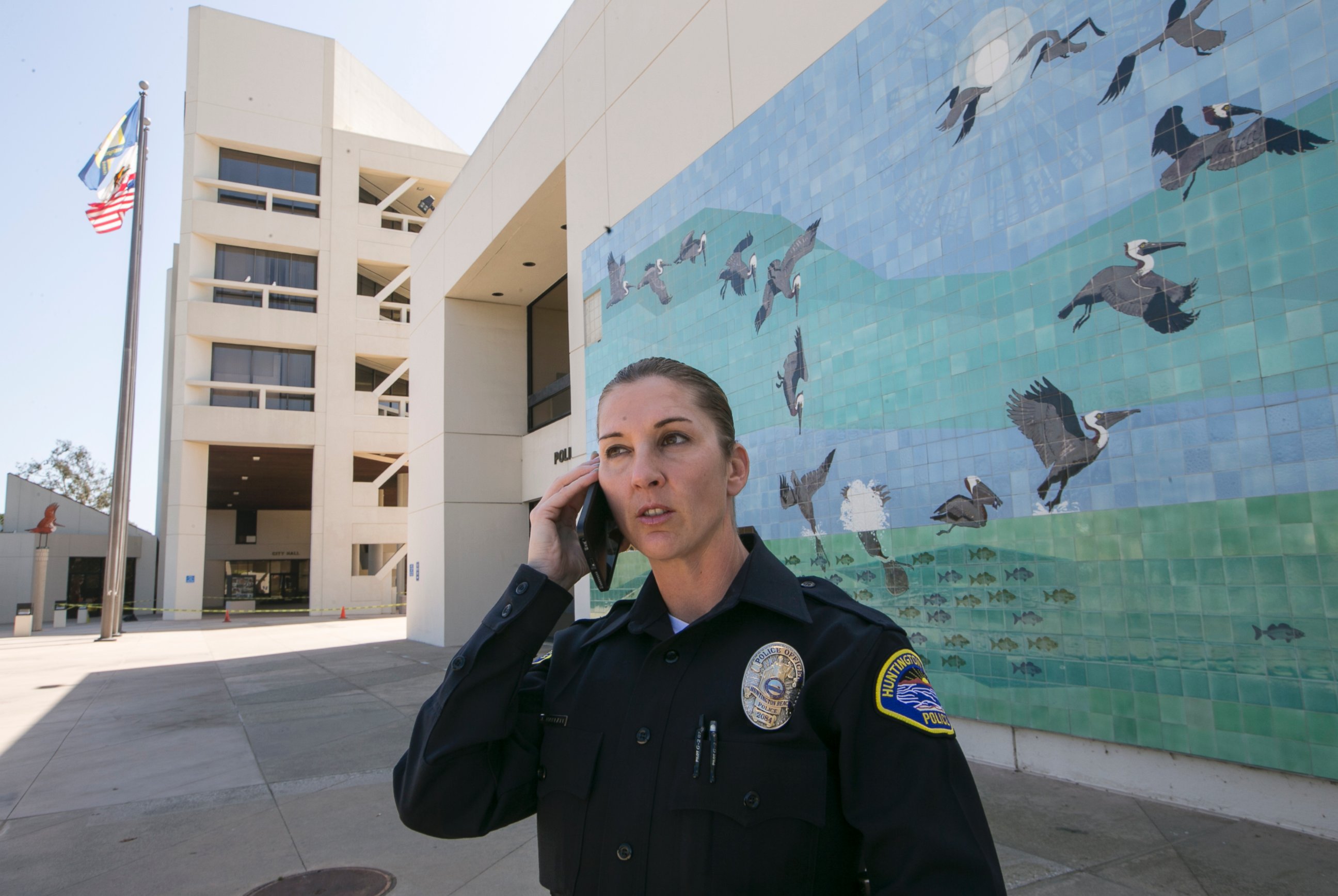 PHOTO: A police officer stands at the location where Denise Huskins, who had been reported missing, was found in Huntington Beach, Calif., March 25, 2015.  