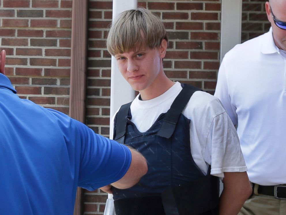 PHOTO: Charleston, S.C., shooting suspect Dylann Storm Roof, center, is escorted from the Sheby Police Department in Shelby, N.C., June 18, 2015. 