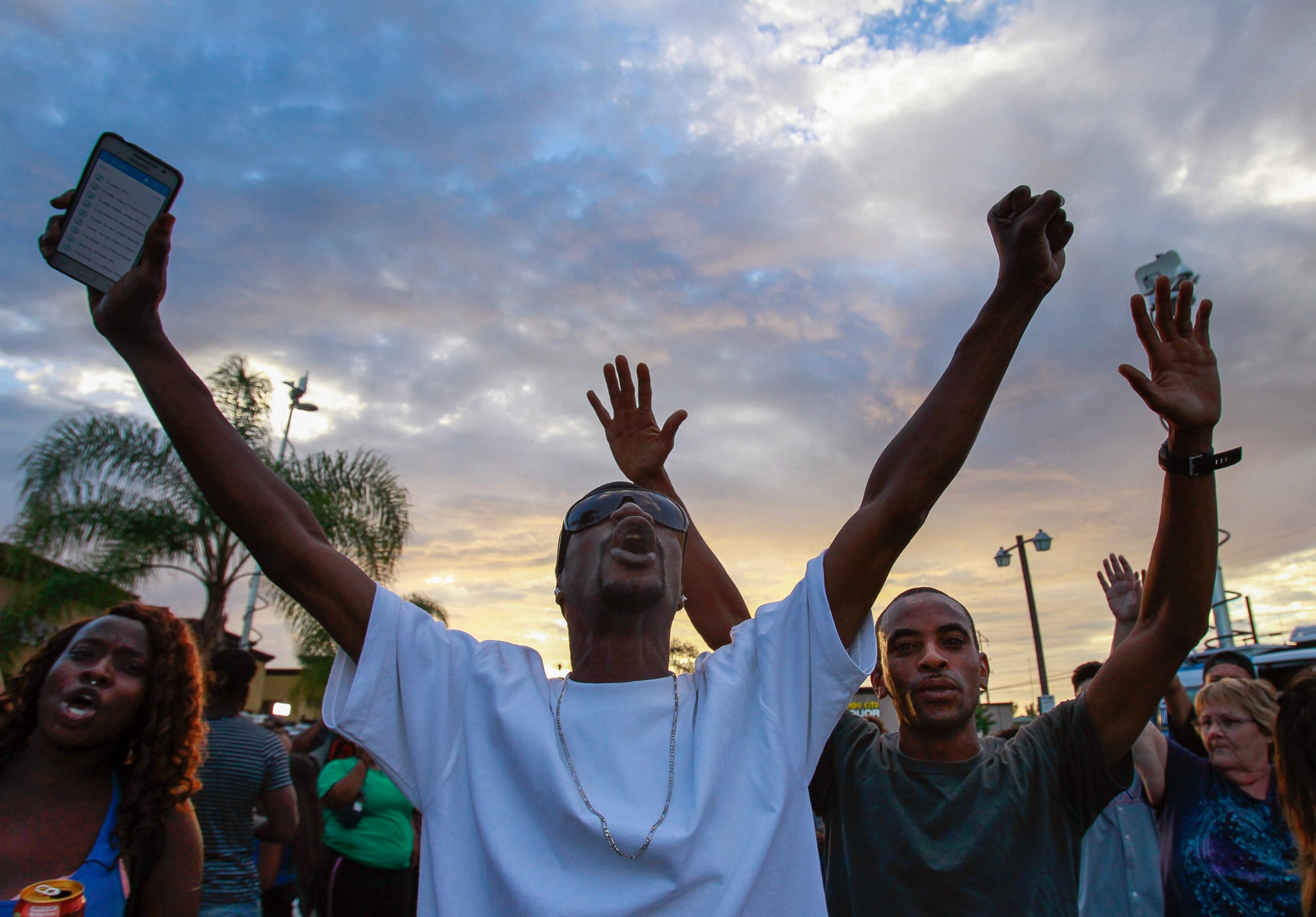 PHOTO: People protest at the scene where a black man was shot by police earlier in El Cajon, east of San Diego, Calif., Sept. 27, 2016. 
