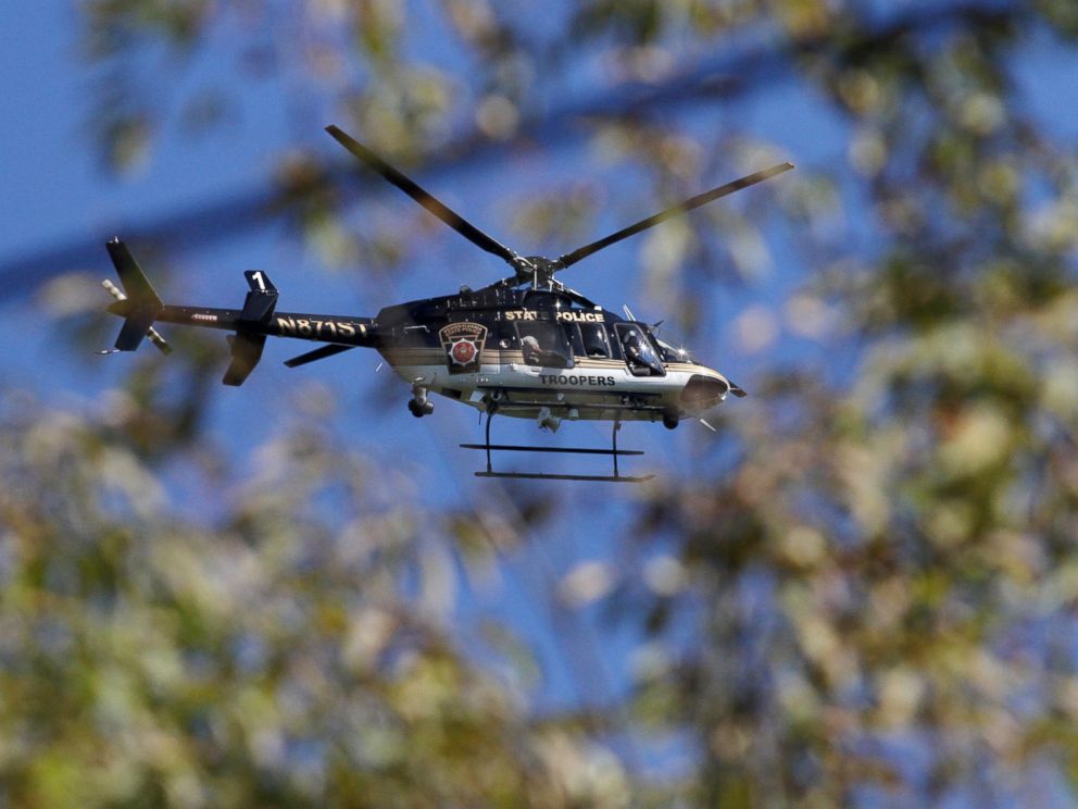 PHOTO: A Pennsylvania State Police helicopter searches for Eric Frein near Canadensis, Pa., on Sept 23, 2014.