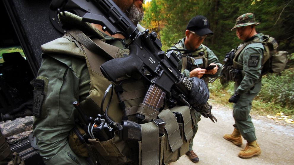 PHOTO: Members of the Scranton Police Special Operations Group prepare to search the woods, Oct. 2, 2014, in Barrett Township near Canadensis, Pa., for suspected killer Eric Frein.