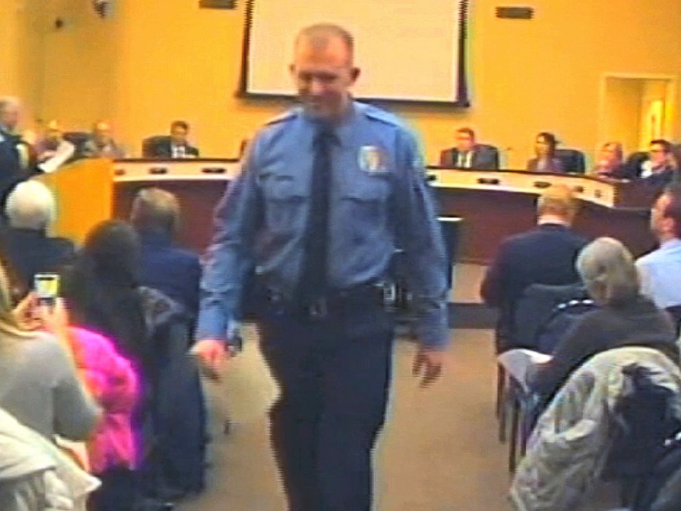 PHOTO: In this Feb. 11, 2014 file image from video provided by the City of Ferguson, Mo., officer Darren Wilson attends a city council meeting in Ferguson.